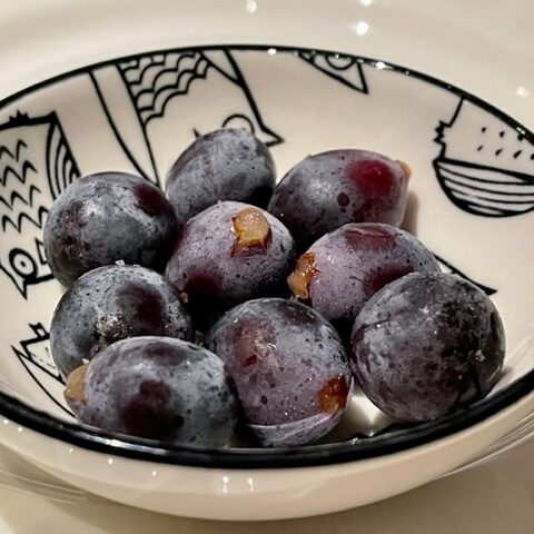 Concord grapes from Keremeos, BC, frozen and ready to serve as a sweet treat.